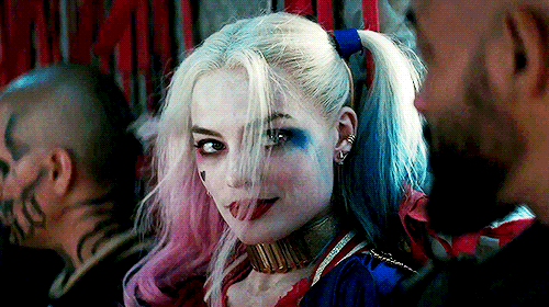 http://www.themarysue.com/wp-content/uploads/2016/10/HarleyQuinnWink.gif