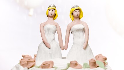 brides on wedding cake