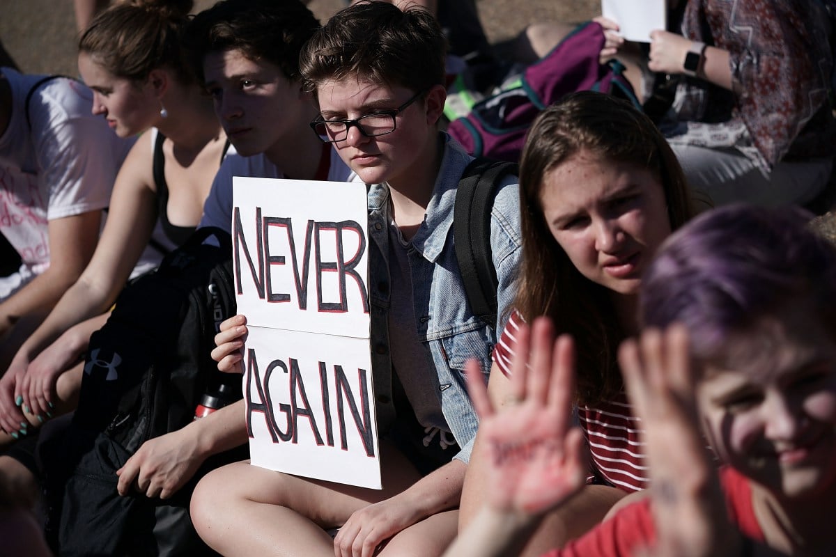 gun violence protest oregon bill law domestic violence abuse partner boyfriend loophole