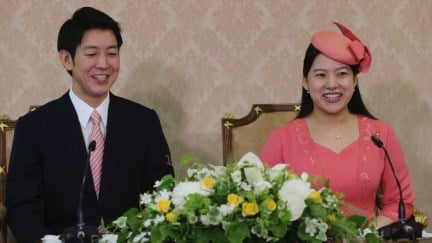 Japanese Princess Ayako (R), the third daughter of the late Prince Takamado, and her fiance Kei Moriya attend a press conference to announce their engagement at the Imperial Household Agency in Tokyo on July 2, 2018. (Photo by Koji Sasahara / POOL / AFP) (Photo credit should read KOJI SASAHARA/AFP/Getty Images)