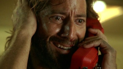 Desmond Hume (Henry Ian Cusack) calls home in LOST episode The Constant