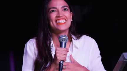 Alexandria Ocasio-Cortez, stuggles, coat, clothes, tweet