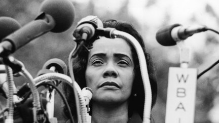 American civil rights campaigner, and widow of Dr. Martin Luther King Jr., Coretta Scott King (1927 - 2006) stands behind a podium covered in microphones at Peace-In-Vietnam Rally, Central Park, New York, April 27, 1968. (Photo by Hulton Archive/Getty Images)