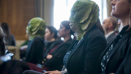 WASHINGTON, DC - MARCH 28: A demonstrator wears a Creature from the Black Lagoon mask as David Bernhardt, President Donald Trump's nominee to be Interior Secretary, testifies during a Senate Energy and Natural Resources Committee confirmation hearing on March 28, 2019 in Washington, DC. (Photo by Zach Gibson/Getty Images)