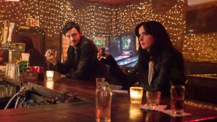 Marvel's Jessica Jones Krysten Ritter and Ben Walker grab a beer.