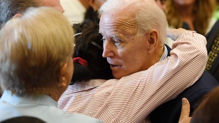 Joe Biden hugs a supporter.