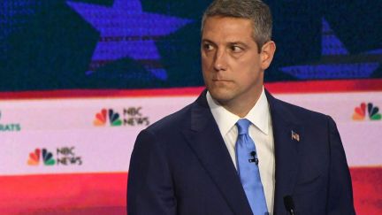 Rep Tim Ryan stares blankly during the Democratic debate.