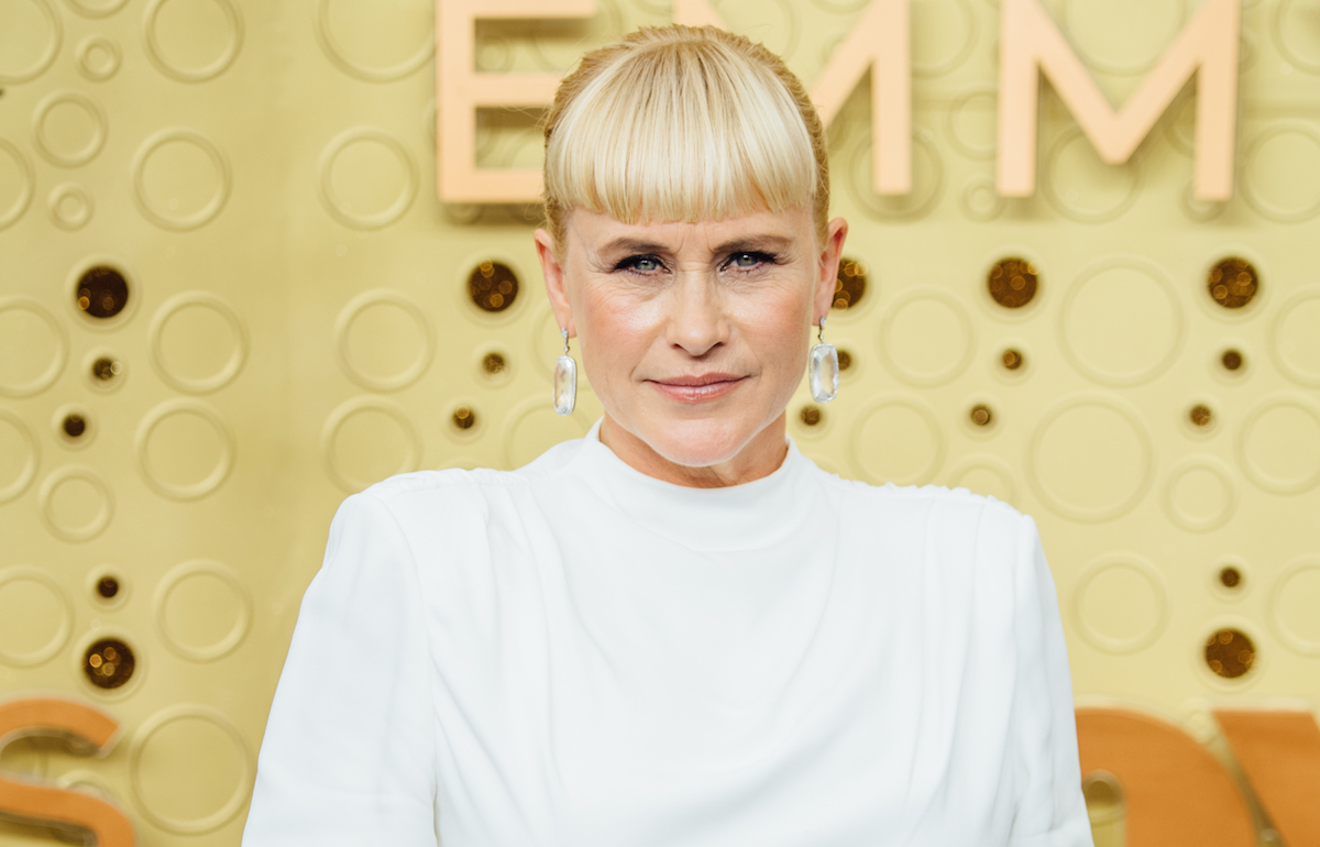 Patricia Arquette poses on the Emmys red carpet.