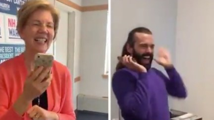 Elizabeth Warren and Jonathan Van Ness talking and laughing.