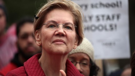 Elizabeth Warren clapping at a rally for striking teachers.