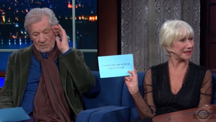 Helen Mirren and Ian McKellen read from cards on the Late Show stage.