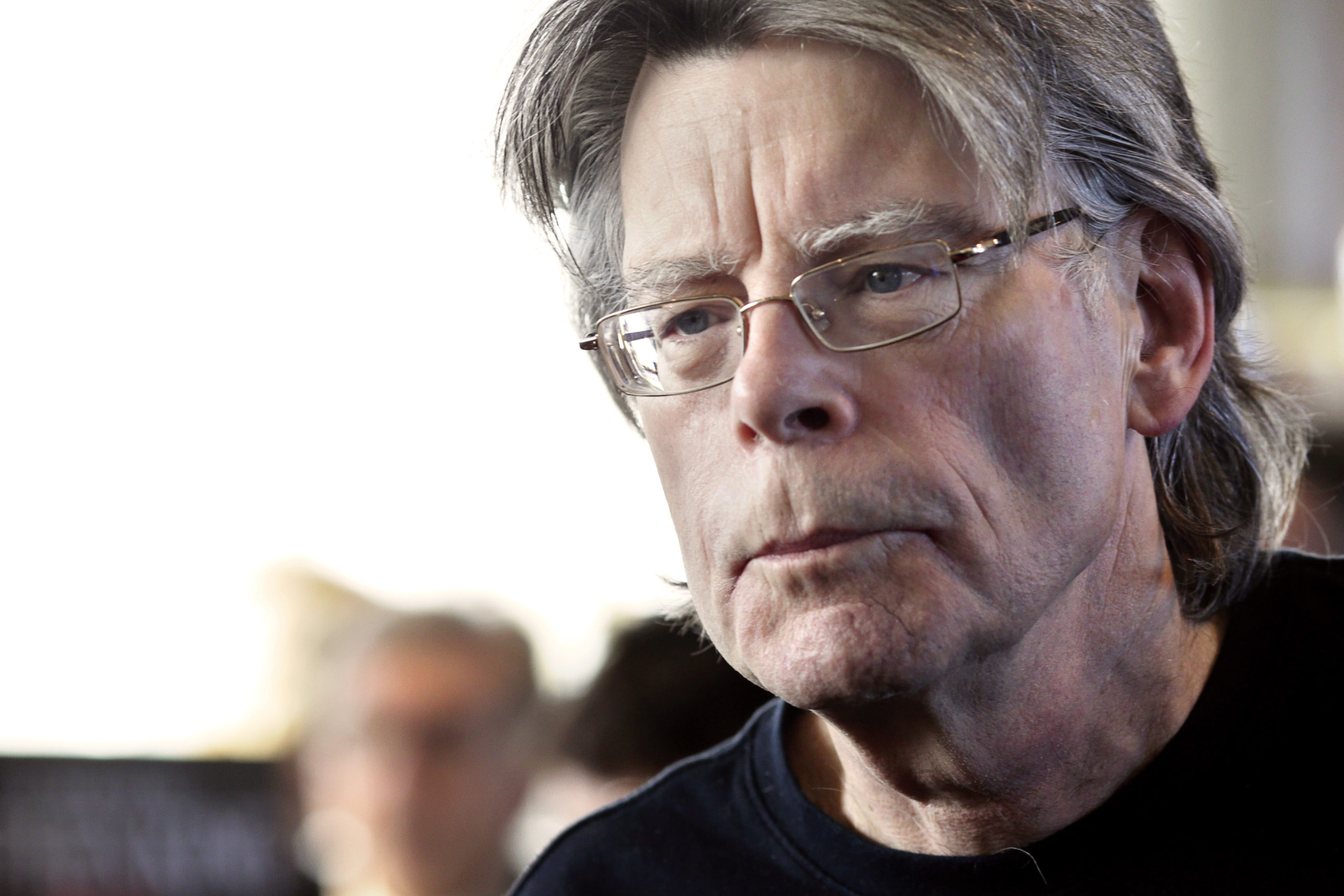 American author Stephen King poses for photographers on November 13, 2013 in Paris, before a book signing event dedicated to the release of his new book "Doctor Sleep", the sequel to his 1977 novel "The Shining". The best-selling author has written over 50 novels and sold 350 million copies worldwide. AFP PHOTO / KENZO TRIBOUILLARD (Photo credit should read KENZO TRIBOUILLARD/AFP via Getty Images)