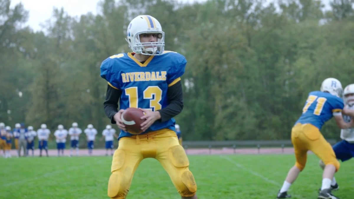 Archie Andrews doing football