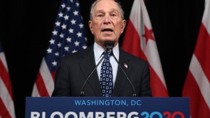 Democratic presidential candidate, former New York City Mayor Michael Bloomberg speaks from a podium.