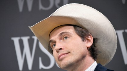 Kimbal Musk wears a big stupid cowboy hat.