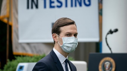 Jared Kushner wears a face mask while as he departs a press briefing