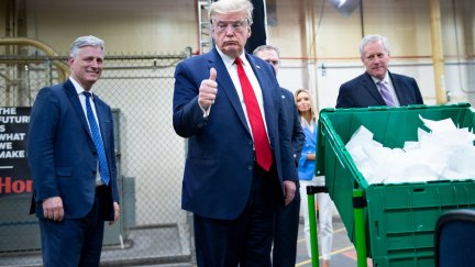 Donald Trump gives a thumbs up while touring a Honeywell International Inc. factory producing N95 masks