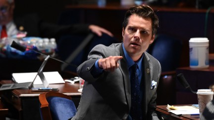 Matt Gaetz points indignantly in Congress.