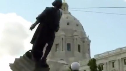 Racist statue being torn down.