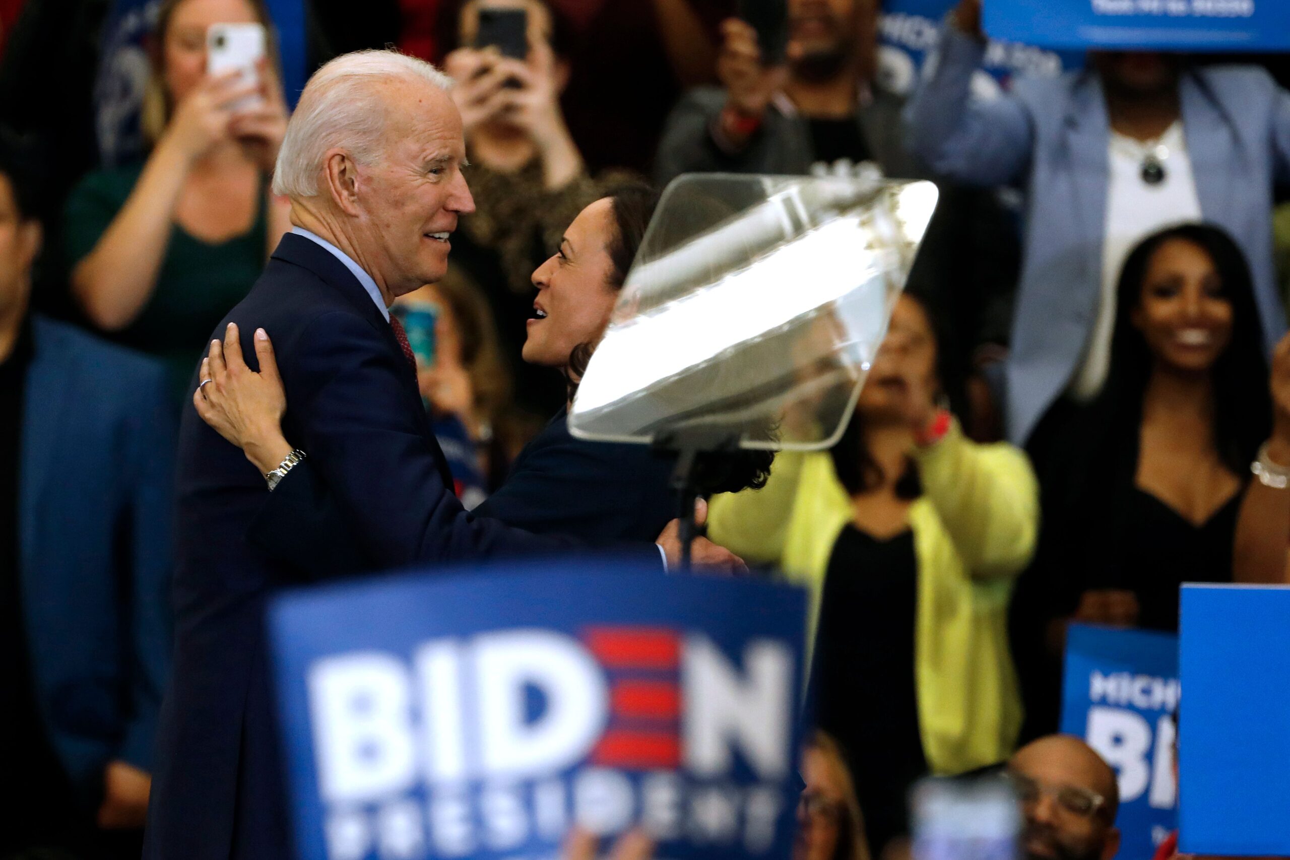 California Senator Kamala Harris (C) hugs Democratic presidential candidate former Vice President Joe Biden after she endorsed him at a campaign rally at Renaissance High School in Detroit, Michigan on March 9, 2020. (Photo by JEFF KOWALSKY / AFP) (Photo by JEFF KOWALSKY/AFP via Getty Images)