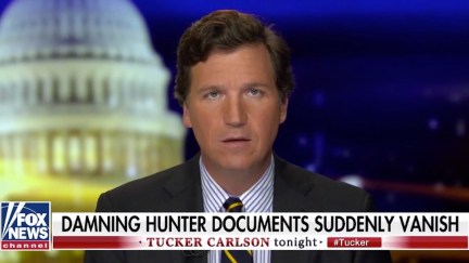 Tucker Carlson gapes over a chyron reading 