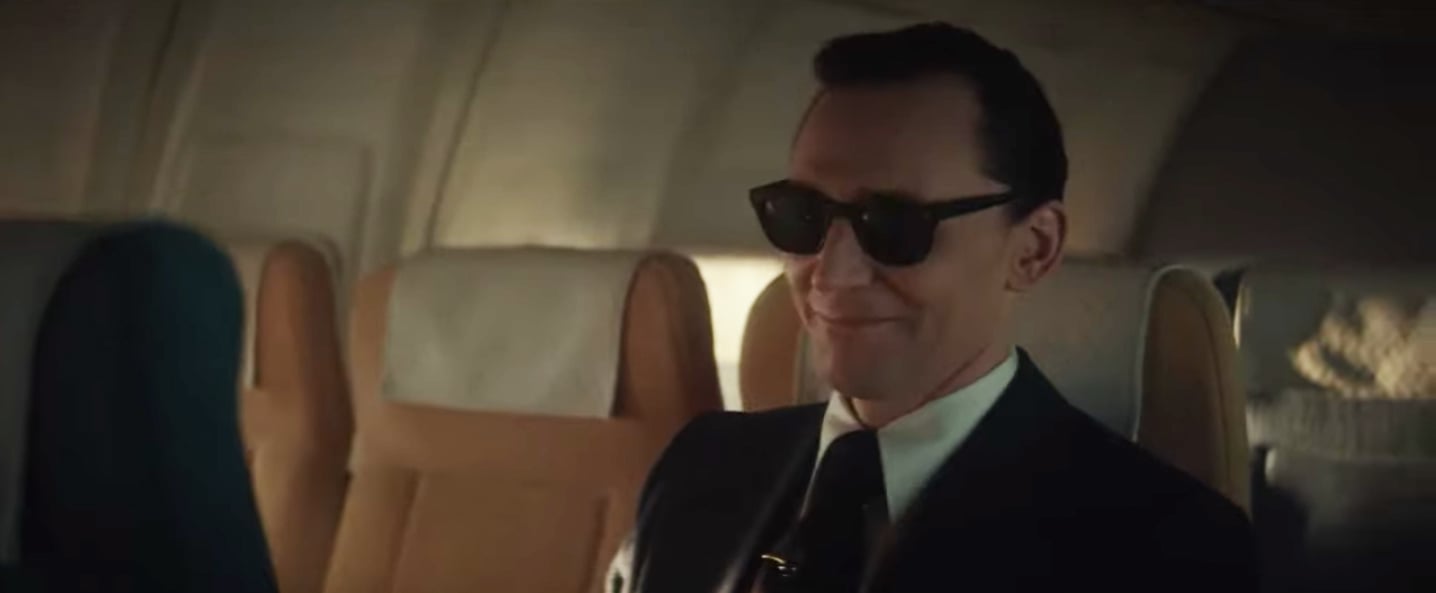 Loki smirking wearing sunglasses