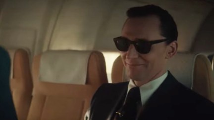 Loki smirking wearing sunglasses