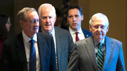 (L-R) Sen. Mike Crapo (R-ID), Sen. John Cornyn (R-TX), Sen. Josh Hawley (R-MO) and Senate Majority Leader Mitch McConnell (R-KY) leave McConnell's office and walk to the Senate chamber