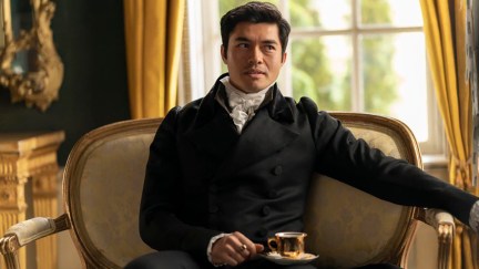 Henry Golding in a cravat