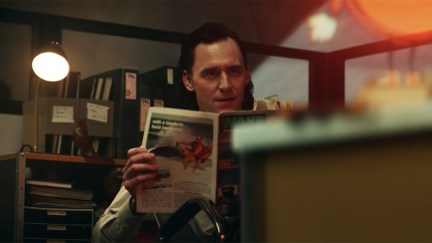 Loki reading the news paper in Loki