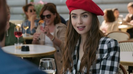 Lily Collins wears a red beret as Emily in Emily in Paris