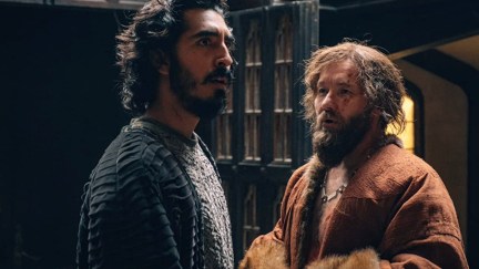 Joel Edgerton and Dev Patel in The Green Knight (2021) just about to be bros