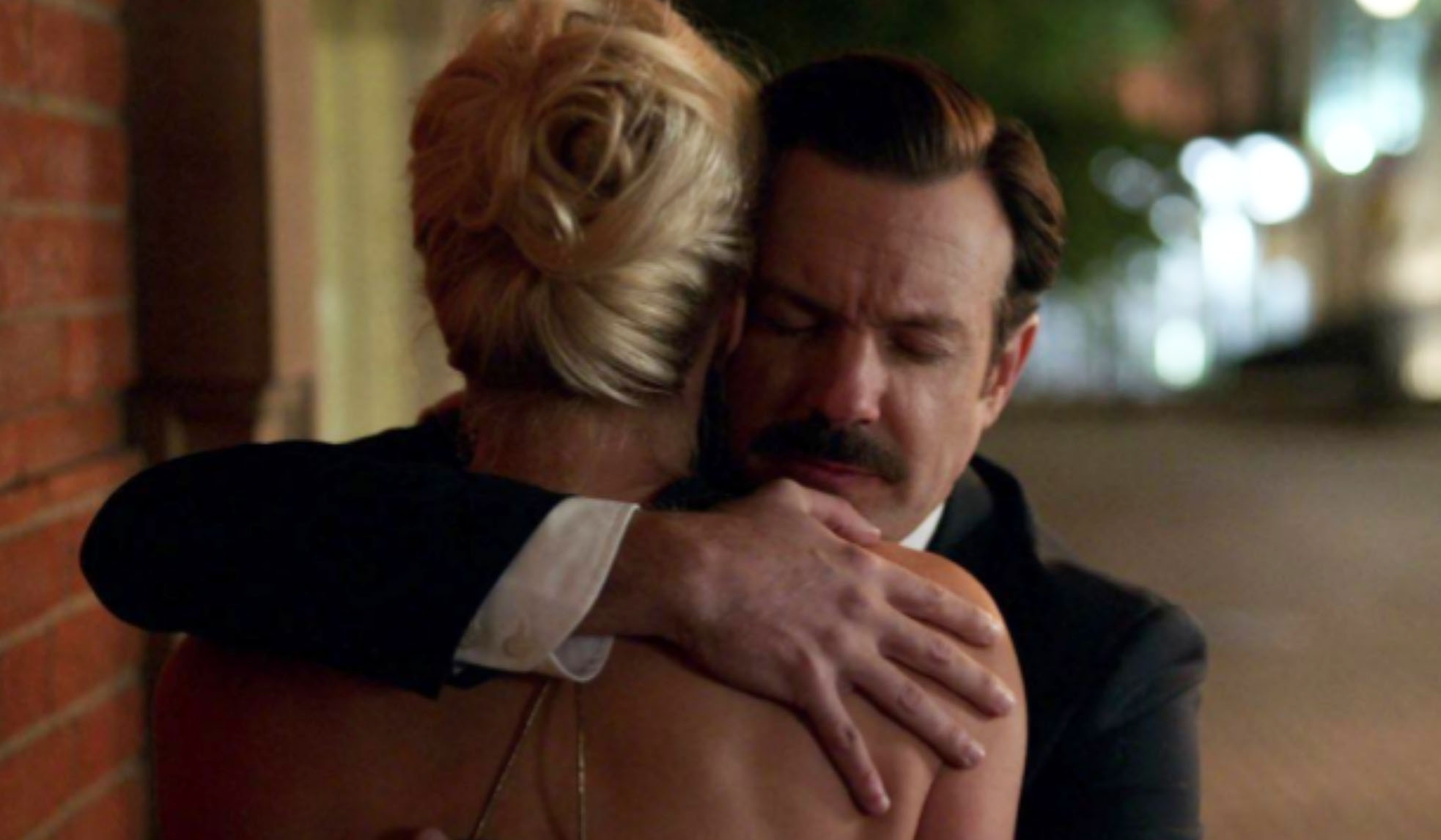 Ted and Rebecca hug on Ted Lasso