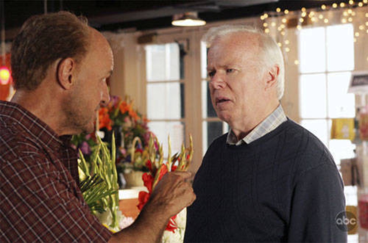 John Locke angrily pointing at his confused-faced father on ABC's Lost.