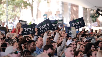 Supporters of Democratic gubernatorial candidate, former Virginia Gov. Terry McAuliffe attend a get-out-the-vote rally