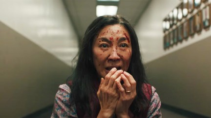 Michelle Yeoh crying with blood on her face in Everything Everywhere All At Once