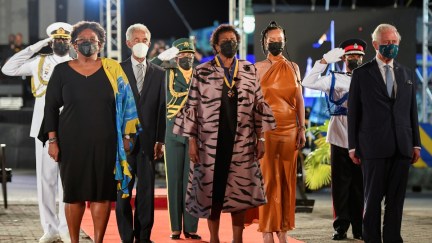 BRIDGETOWN, BARBADOS - NOVEMBER 30: Prime Minister of Barbados Mia Mottley, former cricketer Garfield Sobers, President of Barbados, Dame Sandra Mason, Rihanna, and Prince Charles, Prince of Wales stand during the Presidential Inauguration Ceremony at Heroes Square on November 30, 2021 in Bridgetown, Barbados. The Prince of Wales arrived in the country ahead of its transition to a republic within the Commonwealth. This week, it formally removes Queen Elizabeth as its head of state and the current governor-general, Dame Sandra Mason, will be sworn in as president. (Photo by Toby Melville - Pool/Getty Images)