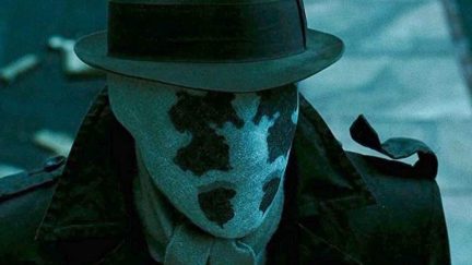 Rorschach looking on in Watchmen