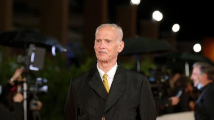 John Waters on the red carpet