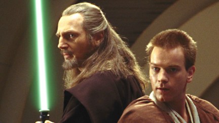 Qui-gon Jinn and Obi-Wan standing back to back