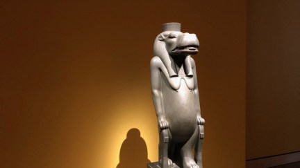 A statue of Taweret, an Egyptian goddess with a hippo's head.