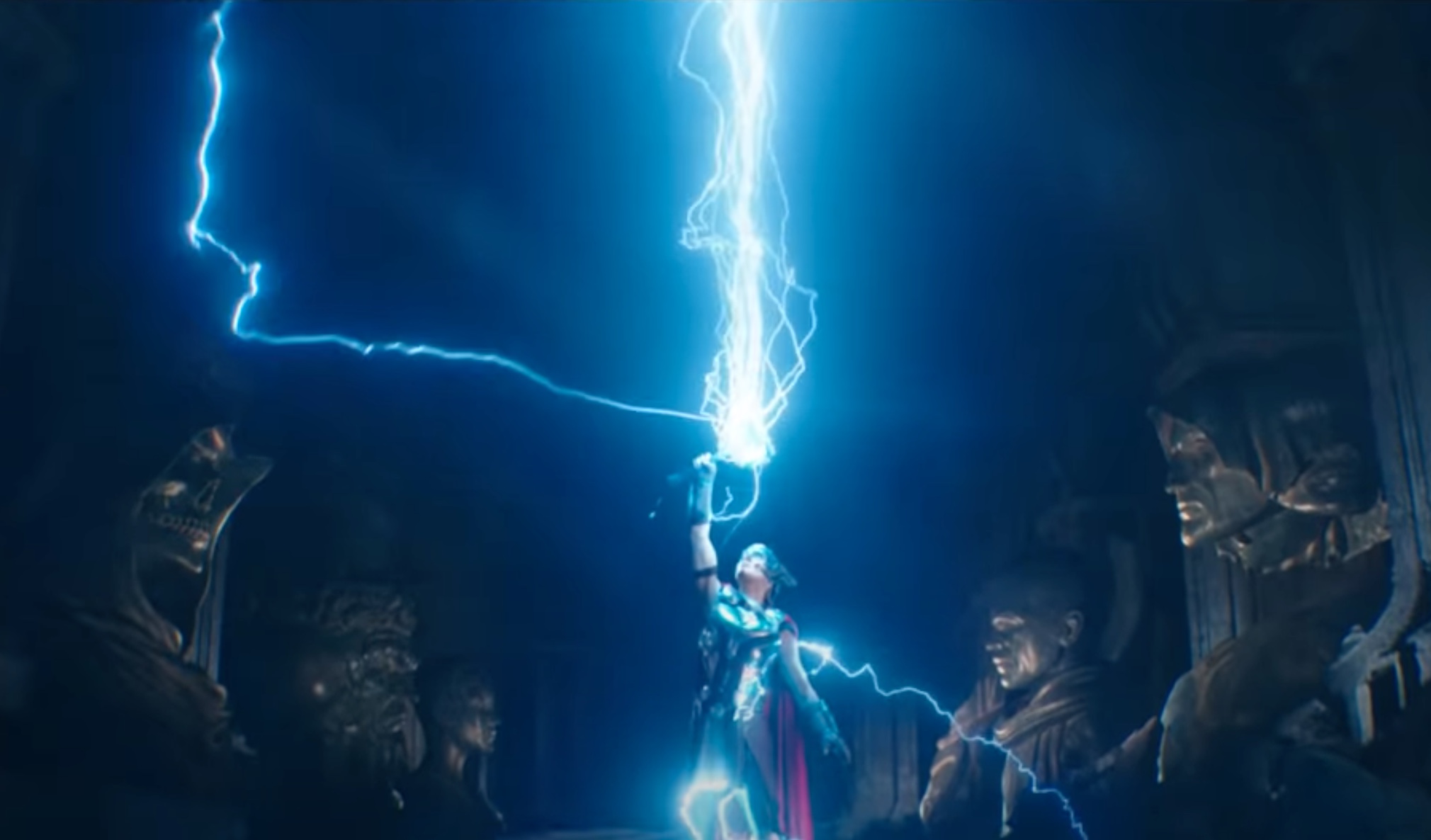 Jane, as the Mighty Thor, summons lightning with Mjolnir.