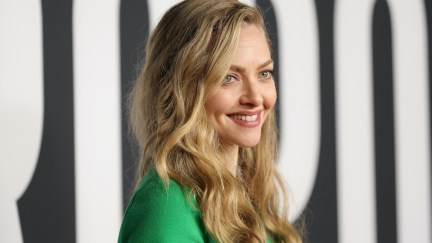 Amanda Seyfried smiles on a red carpet.