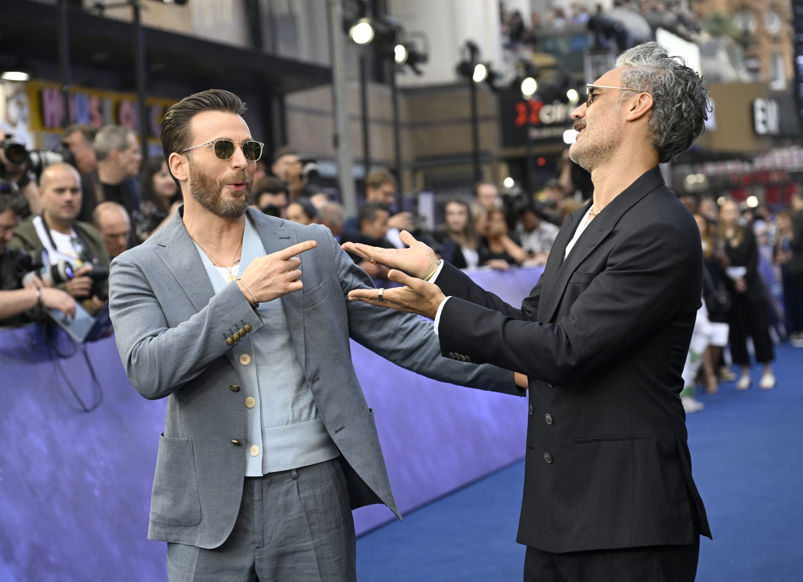 Chris Evans and Taika Waititi on the Lightyear blue carpet