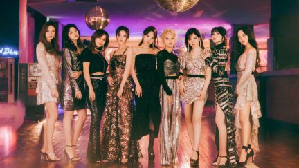 The nine members of K-Pop girl group TWICE during the promotions for their Japanese release Kura Kura