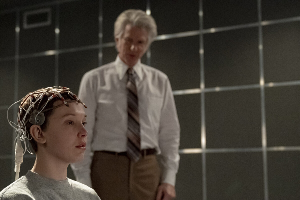 Eleven and Dr. Martin Brenner do experiments in Stranger Things season 4