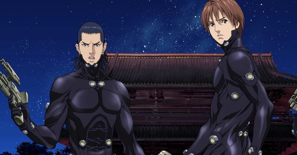 Two teenage boys in black super suits look ready for action in "Gantz"