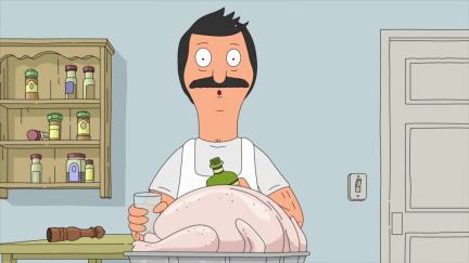 Bob's Belcher stands over a raw turkey