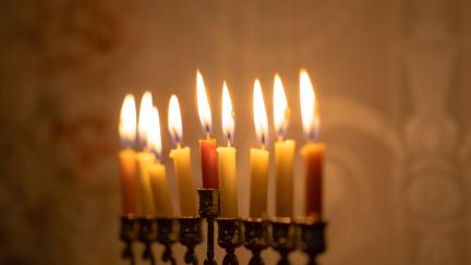 A lit menorah.