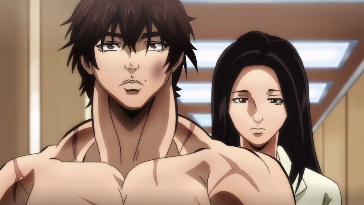 Baki and his mom stand in a hallway in "Baki"